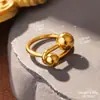 Aço titânio europeu e americano moda Coringa aço inoxidável folhas linha oval nicho luxo leve abertura anel ajustável atacado