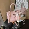 Bolso casual de nicho transfronterizo para mujer, nuevo y elegante de la primavera de 2026, bolso de mano cruzado de un solo hombro de alto valor para mujer