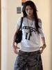 Camiseta Feminina Casual Solta de Manga Curta Sexy Retrô Americana Ombro a Ombro Estilo Preguiçoso Design de Nicho Sexy Moderna Marca Top