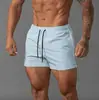 2024 Amazon pantalones cortos deportivos para hombre de secado rápido para playa de tres puntos pantalones de marca de moda para baloncesto fabricantes venta al por mayor