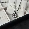 Nuevo collar colgante de paz de obsidiana negro y plateado estilo chino para hombres y mujeres, colgante Pixiu, accesorio de cuerda trenzada de nicho de alta gama para parejas