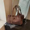 Bolso moderno con hebilla de cinturón para mujer, nuevo estilo 2026, bolso de hombro versátil, bolso tote para el trabajo, gran capacidad, bolso de axila, transfronterizo