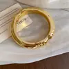 Pulsera de Pliegues Geométricos Lisos Transfronteriza Europea y Americana Pulsera Versátil de Moda Simple Pulsera Versátil de Lujo Ligero con Sensación de Alta Gama Accesorio para Mujer