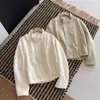 Chaqueta de trabajo versátil estilo coreano para principios de primavera de 2026, simple, casual, elegante, con cuello alto