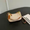 Bolsa de axila feminina de nicho, nova tendência 2026 outono vintage super popular bolsa de ombro, bolsa transversal de alta qualidade para o dia a dia