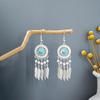 Pendientes geométricos redondos de estilo étnico transfronterizo europeo y americano, con borlas largas y atracciones turísticas retro bohemias.