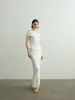 Top de punto Longmei de hombros descubiertos 26 nuevo de principios de otoño estilo VKC diseñador suéter de punto ajustado