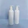 Suministro directo de fábrica FUENTE 500ml hombro redondo empaque de química diaria transparente botella vacía para emulsión tapa de rosca de presión plástico PET sub-botella
