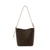 Bolsa pequeña súper caliente de comercio exterior, nuevo estilo 2026 para mujer, bolso pequeño tipo cubo de nicho, moderno, elegante, versátil, bolso de un solo hombro cruzado