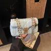 Bolso Pequeño Cuadrado Acolchado Súper Popular para Mujer, Bolso Nuevo de Cadena Primavera 2026, Bolso de Hombro Cruzado de Alta Gama, Bolso Pequeño, Bolso para Teléfono Móvil