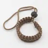 Pulsera de supervivencia al aire libre, pulsera para cámara, pulsera con paraguas, cuerda trenzada, colgante universal, pulsera de cuerda trenzada para paraguas.