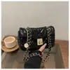 Bolso de mujer 2026 nuevo modelo, diseño de nicho, casual, único, moderno, bolso de hombro para debajo del brazo, bolso cuadrado pequeño cruzado con cadena