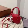 Nuevo Diseño Exclusivo 2025 Moda Coreana Textura Bolso de Mano Bolso Bowling para Mujer Versátil Bolso de Hombro Cruzado