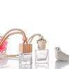 Venta al por mayor de botella de aromaterapia de vidrio creativa de 8 ml, colgante de botella vacía, subpaquete para coche, botella de aceite esencial, colgante de desodorante fresco