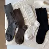 Novas Meias da Série Cinza Outono/Inverno 2026 Algodão Penteado Cor Lisa Ponto Duplo Meia-Calça Afinando Estilo College Comprimento do Joelho Meia da Panturrilha para Mulheres