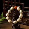 Semilla de Bodhi de Seis Puntas y Cinco Ojos Semilla Original Fruta de Cinco Ojos con Cuentas de Transferencia de Cera de Abeja Pulsera Estilo Retro Tibetano para Hombres y Mujeres