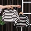 Ropa de otoño 2024 para niños suéter para niño 1-5 años camiseta infantil de estilo occidental a rayas de manga larga top de una pieza a rayas para bebé