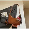 Bolso de Axila para Mujer Otoño e Invierno 2025 Nueva Moda Diseño de Nicho Bolso de Hombro Único Cruzado Bolso de Mujer de Gama Alta Tipo Empanada