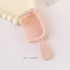 Nuevo y lindo mini peine de lazo con alto valor estético, peine de mango portátil para estudiantes, peine para peinar el cabello de niñas al por mayor