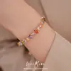 Pulsera extensible ovalada chapada en oro real con incrustaciones de circonita, sensación de lujo ligero de nicho de alta gama, accesorio de mano simple y elegante