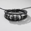Pulsera vintage personalizada de metal punk de calavera para hombre, pulsera de cuero tejido, superventas transfronterizas en Europa y Estados Unidos