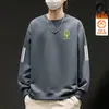 Sudadera de forro polar para hombre de otoño e invierno, corte holgado, cuello redondo, sin capucha, manga larga, top versátil, chaqueta sin capucha