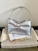 Moda transfronteriza simple para el día a día 2026 verano nuevo bolso de mano con lazo bolso de hombro bolso personalizado bolso de axila