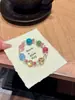 [Carta Día de Primavera de Siete Colores] Pulsera Original de Cristal Natural Multicolor Precioso de Doble Fila Pulsera Arcoíris de Dopamina de Cristal Blanco