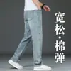 Jeans negros de alta gama para hombre, pantalones rectos holgados para hombre, nuevo modelo de otoño 2026, pantalones largos casuales de negocios para mediana edad