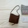 Bolso Cubo de Verano 2026 Nuevo Estilo Coreano de Moda para el Trabajo y el Viaje, Bolso de Hombro Personalizado de Color Sólido, Bolso de Mano Estilo Universitario