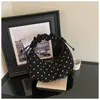 Bolsa de Dumpling Suede Bolinhas Retro Nicho Coreano Feminina 2026 Nova Grande Capacidade para o Trabalho Ombro Único Subarmela Tendência