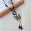 Nuevo collar de cerámica estilo étnico vintage para mujer, cadena larga para suéter, pequeños accesorios transfronterizos, venta al por mayor desde el fabricante