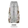 Bolsa de comercio transfronterizo empalmada GPgy estampado de leopardo teñido anudado sensación pantalones ligeros hombres diseño de sistema visual uña de cuchillo curvo cuenta hacer