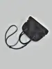 Bolso Nuevo Modelo 2026 con Forma de Concha Negra Hecho de Piel de Vaca de Primera Capa, Bolso de Mano y Bolso Cruzado, Bolso de Hombro Simple y Versátil para el Viaje Diario