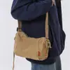 Bolsa de Ombro para Homens e Mulheres 2026 Novo Estilo Japonês Simples Bolsa de Lona Jeans Bolsa Transversal Bolsa Mensageiro de Aula para Estudantes Universitários