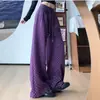 Pantalones anchos de lunares negros estilo coreano para mujer, adecuados para primavera y otoño, con caída fluida, cintura con cordón, tiro alto y un estilo relajado y casual con estampado floral