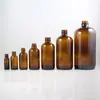 Botella de Vidrio Boston Marrón de 500ml 1000ml al por Mayor Tapa de Baquelita Tapa de Plástico Fenólico Sello