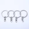 Al por mayor Varios Estilos de Aleación de Zinc Metal Juguete Ferretería Accesorios Llavero Regalo Ferretería Llavero Hebilla para Perro Gancho