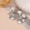 Joias Transfronteiriças Europeias e Americanas Ins Brincos Personalizados de Flor de Cinco Pétalas em Camada Dupla Brincos com Franjas de Folha Risca Retro Fabricante