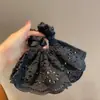 Versión coreana de falda de encaje negro anillo para el pelo de intestino grueso cuerda para la cabeza de mujer sentido de alta gama flor para la cabeza cuerda para coleta de pelo lote