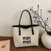 Nova Bolsa de Mão Popular Feminina Transfronteiriça de Verão Tendência Bolsa de Ombro para Praia Transversal Fashionável Bolsa Tecida de Nicho