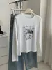 Camiseta de manga larga para mujer con estampado de cachorro de dibujos animados estilo coreano, otoño e invierno 2026, elástica, versátil, Tencel sintético, cuello redondo, camiseta básica