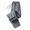 Pantalones gruesos con forro polar para otoño e invierno, nuevos, holgados, combinables, casuales, de moda, para hombre, pantalones deportivos de talla grande con cremallera y bolsillo.
