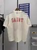 Novo Estilo Europeu e Americano Design Vazado 80 Estrelas Digitais Blusa de Tricô Solta Gola Redonda Manga Curta Esportiva Tendência Masculino e Feminino