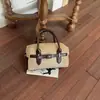 Elegante bolso de bolos de bloques de color de alta calidad para mujer, un bolso de hombro que también se puede llevar cruzado, nuevo bolso tote casual y elegante otoño 2026