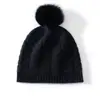 Venta al por mayor de fábrica Cachemira Transfronterizo Otoño e Invierno Nuevo Tejido de Punto Grueso con Trenzas y Pompón Protector contra el Frío Cálido Gorro de Punto
