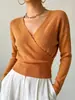 2026 Loja Independente de Desejos Transfronteiriços Novo Top de Tricô Feminino Estilo Europeu e Americano Confortável e Elegante Cor Sólida Manga Longa Decote V
