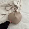 Bolso bandolera de moda con forma de corazón, estilo occidental, color sólido, para mujer, nuevo de primavera 2024, bolso casual ins que combina con todo, bolso de mujer