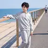 Conjunto de Ropa de Otoño para Niños Estilo Coreano Ropa Infantil 2026 Nuevas Llegadas de Otoño Sudadera Casual Falsa de Dos Piezas para Niños Pantalones Casuales de Pierna Curva para Niños