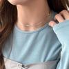 Collar con colgante de hueso de serpiente y lazo de plata de ley S925, diseño de nicho, cadena de cuchillas con un toque moderno, gargantilla corta